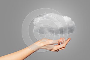 Hand of woman with light cloud - computing concept
