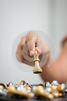Hand of woman playing chess for business tactic and planning met