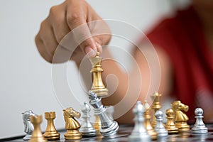 Hand of woman playing chess for business tactic and planning met