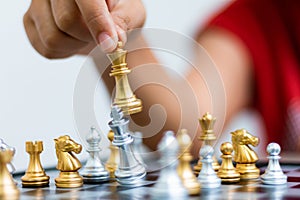 Hand of woman playing chess for business tactic and planning met