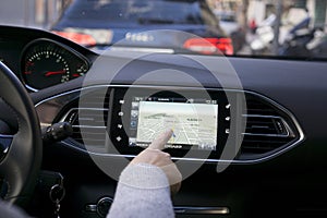 Hand woman using car gps