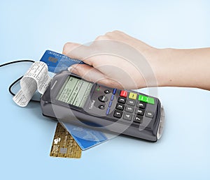 Hand of woman using payment terminal, paying with credit card, f