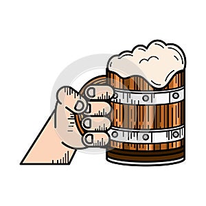 hand with wooden mug of beer