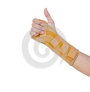 Hand with a wrist brace, orthopedic equipment isolated on white, insurance concept