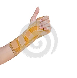 Hand with a wrist brace, orthopedic equipment isolated on white, insurance concept