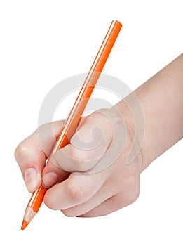 Hand writes by orange pencil isolated