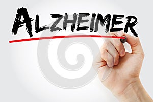 Hand writing Alzheimer with marker, concept background