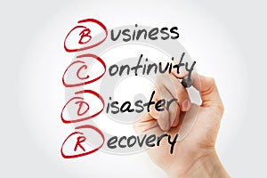 Hand writing BCDR - Business Continuity Disaster Recovery with marker, acronym business concept