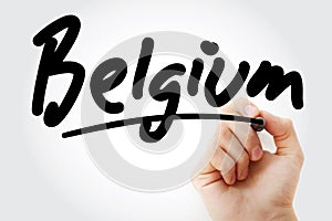 Hand writing Belgium with marker