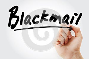 Hand writing Blackmail with marker