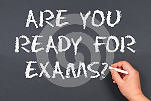 Hand writing chalk on a blackboard text: Are You Ready For Exam