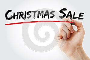 Hand writing Christmas SALE with marker, concept background