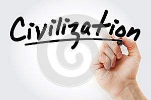 Hand writing Civilization with marker