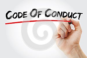 Hand writing Code Of Conduct with marker, business concept background