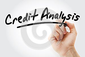 Hand writing Credit Analysis with marker