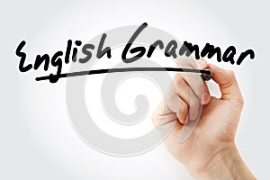 Hand writing English grammar with marker