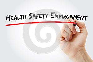 Hand writing Health Safety Environment with marker, concept background