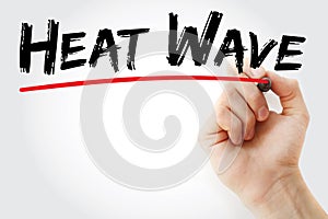 Hand writing Heat wave with marker