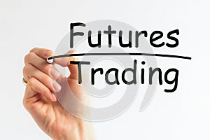 Hand writing inscription FUTURES TRADING with marker, concept, the letters in black, financial and trading concept
