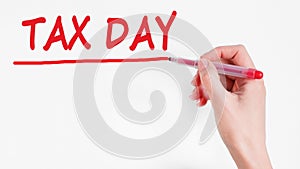 Hand writing inscription tax day with marker, concept, stock image