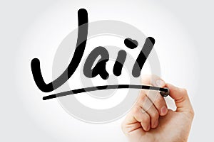 Hand writing Jail with marker