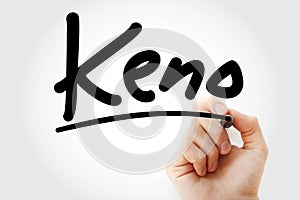 Hand writing Keno with marker
