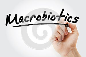 Hand writing Macrobiotics with marker