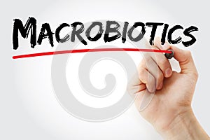 Hand writing Macrobiotics with marker