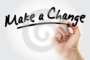 Hand writing Make a Change text with marker