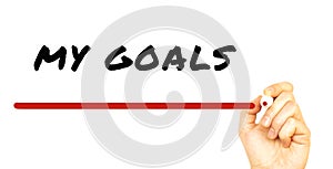 Hand writing MY GOALS with red marker. Isolated on white background