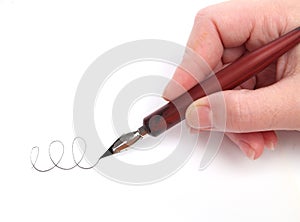 Hand writing with a nib photo