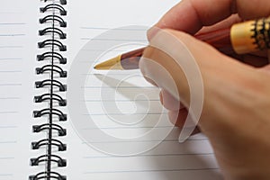 Hand writing on notebook