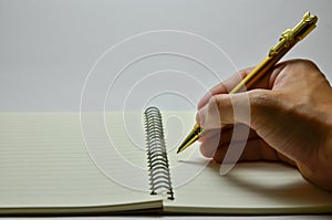 hand writing on notebook