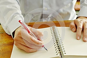 Hand writing on paper book binding