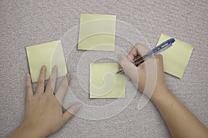 Hand writing in paper note on fabric