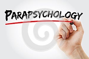 Hand writing Parapsychology with marker