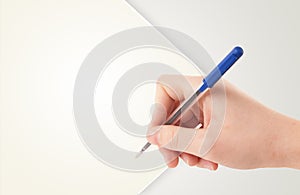 Hand writing on plain empty white paper copy space