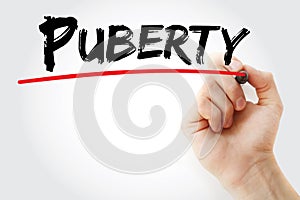 Hand writing Puberty with marker, concept background