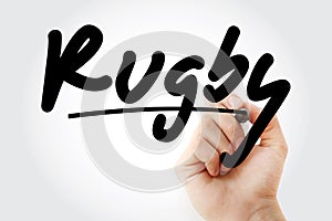 Hand writing Rugby with marker