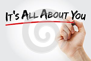 Hand writing It`s All About You with marker, health concept background