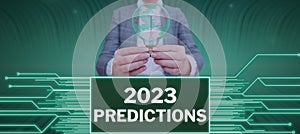 Hand writing sign 2023 Predictions. Internet Concept list of things you feel that going to happen without proof