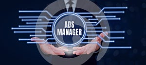 Hand writing sign Ads Analysisager. Word for oversee and control the various advertising activities photo