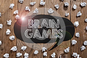 Hand writing sign Brain Games. Concept meaning psychological tactic to manipulate or intimidate with opponent