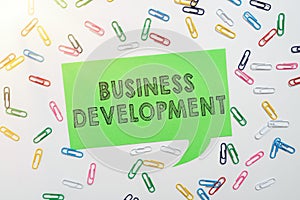 Hand writing sign Business Development. Word for Implement Growth Value within and between company