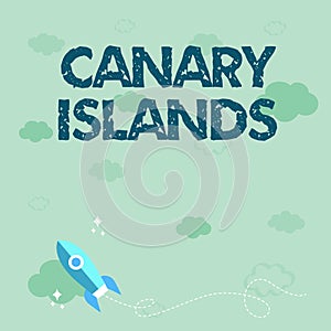 Hand writing sign Canary Islands. Business idea a group of mountainous islands in the Atlantic Ocean Rocket Ship