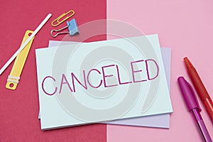 Hand writing sign Canceled. Internet Concept to decide not to conduct or perform something planned or expected Flashy photo