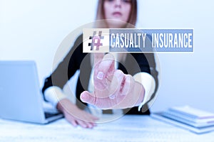 Hand writing sign Casualty Insurance. Word for overage against loss of property or other liabilities Assistant Offering photo