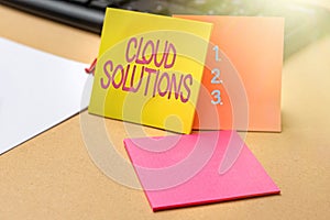 Hand writing sign Cloud Solutions. Business showcase ondemand services or resources accessed via the internet Multiple photo
