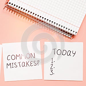 Hand writing sign Common Mistakes. Internet Concept repeat act or judgement misguided or wrong
