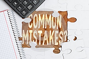 Hand writing sign Common Mistakes Question. Business idea repeat act or judgement misguided making something wrong
